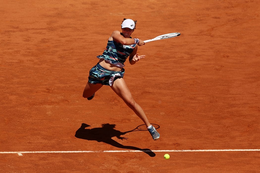 Iga Swiatek plays a forehand on her way to the WTA Rome title in 2022