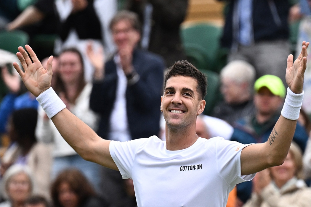 Thanasi Kokkinakis celebrates his first-round win over Felix Auger-Aliassime at Wimbledon