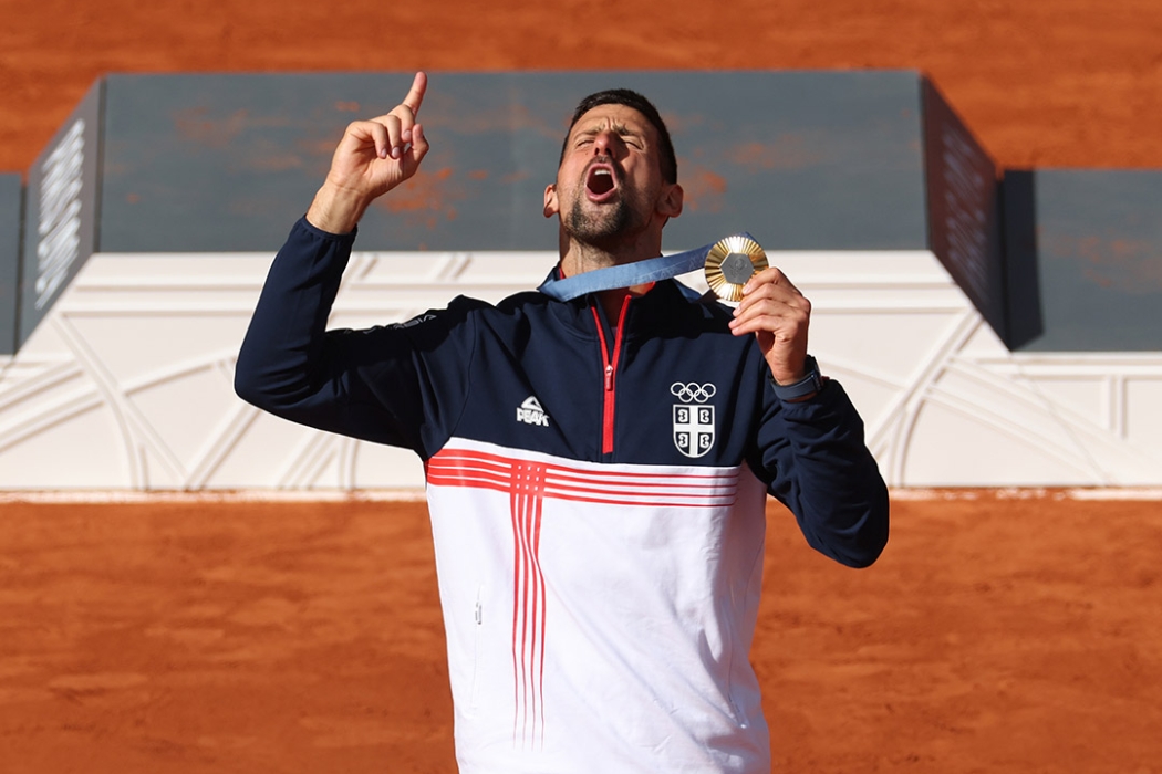 Novak Djokovic celebrates his Olympic singles gold medal at Paris 2024