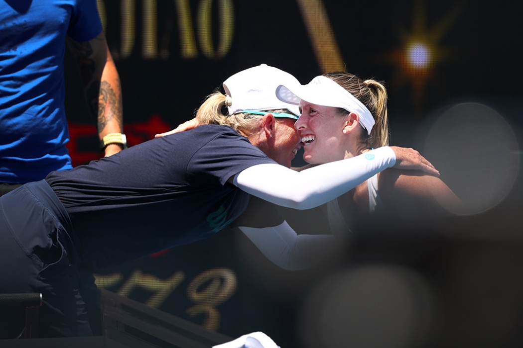 Storm Hunter embraces coach Nicole Pratt after winning her first-round match at Australian Open 2026