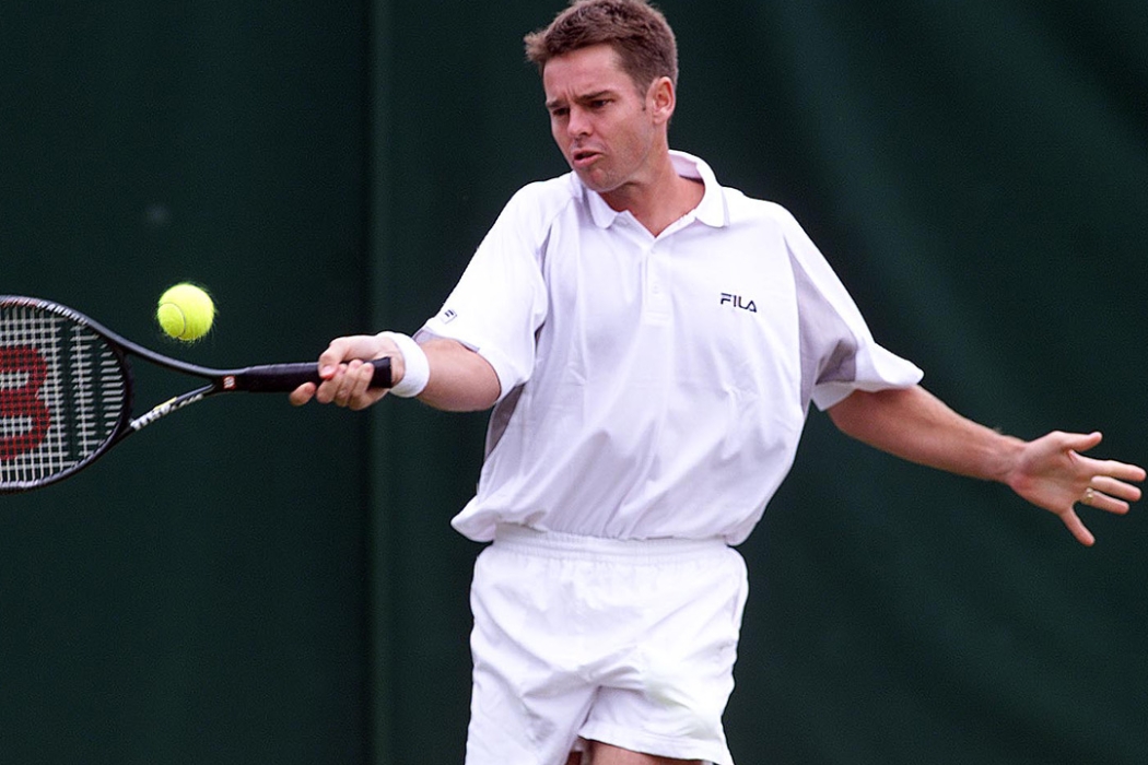 Todd Woodbridge competes at Wimbledon in 2001