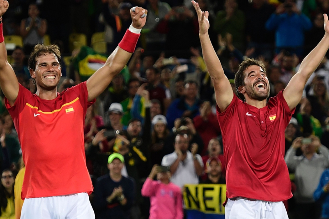 Rafael Nadal and Marc Lopez celebrate winning gold in the men's doubles at Rio 2016