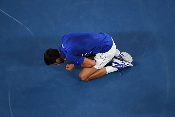 Novak Djokovic celebrates victory at Australian Open 2019