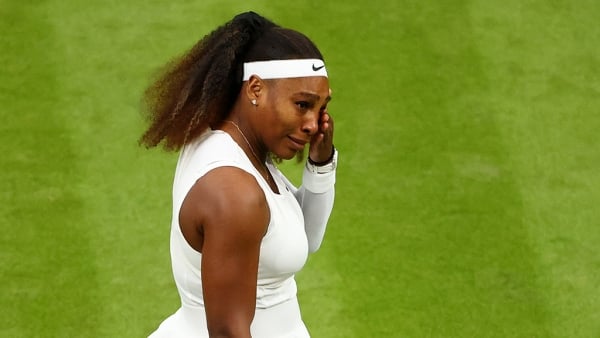 Serena Williams reacts after suffering an injury at Wimbledon