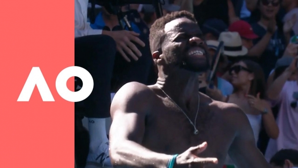 Tiafoe celebrates with family and friends after defeating Dimitrov